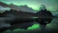 Aurora Borealis on display at the iconic Vestrahorn mountain in Stokksnes, East Iceland