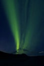 Aurora Borealis against the sunset sky in Iceland