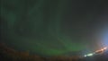 Aurora borealis in night northern sky. Ionisation of air particles in the upper atmosphere.