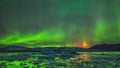 Aurora borealis in night northern sky. Ionisation of air particles in the upper atmosphere.