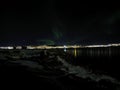 Aurora borealis at night in tromsoe city