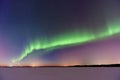 Aurora Borealis above frozen lake Royalty Free Stock Photo