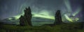 Aurora Borealis (Northern Lights) above Icelandic rock formation