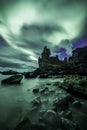 Aurora Borealis (Northern Lights) above londrangar rock formation