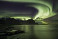 Aurora Borealis Northern Lights above Stokksnes Beach and Vestrahorn Mountains, Iceland Royalty Free Stock Photo