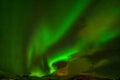 Amazing northern lights, aurora borealis over the mountains in the North of Europe - Lofoten islands, Norway Royalty Free Stock Photo