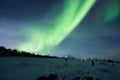 Aurora Borealis, northern lights over a hill in Norway Royalty Free Stock Photo