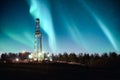 Aurora borealis Northern lights over oil gas drilling rig Royalty Free Stock Photo