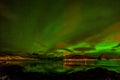 Amazing northern lights, aurora borealis over the mountains in the North of Europe - Lofoten islands, Norway Royalty Free Stock Photo