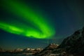 Amazing northern lights, aurora borealis over the mountains in the North of Europe - Lofoten islands, Norway Royalty Free Stock Photo