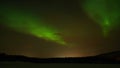 Aurora Borealis Northern Lights seen on a cold winter day in Narvik, Norway. Royalty Free Stock Photo