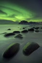 Aurora borealis over a beach on the Lofoten in Norway