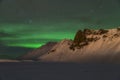 Aurora borealis over the mountains