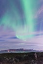 Aurora Borealis over mountains outside Reykjavik, Iceland Royalty Free Stock Photo