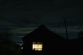 Aurora borealis over an old house