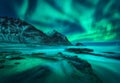 Aurora borealis over snowy mountains, sea coast with sandy beach