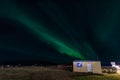 Aurora borealis in village of Hrisey in North Iceland