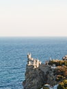 Aurora cliff with Swallow's Nest castle in evening Royalty Free Stock Photo