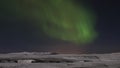 Aurora in Night Sky. Iceland. Snow. Night Royalty Free Stock Photo