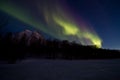 Aurora northern light over the winter sea ice