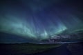 Aurora over Icelandic Lava Field Road Royalty Free Stock Photo