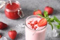 Indian strawberry lassi or milkshake on gray background