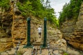 Visitor crossing adventurous rope bridge over Ausable River at Ausable Chasm in Upstate New York Royalty Free Stock Photo