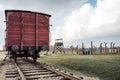 Auschwitz Birkenau II Concentration and Extermination Camp Oswiecim Poland Single red train railway carriage wooden non tracks Royalty Free Stock Photo