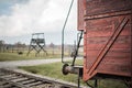 Auschwitz Birkenau II Concentration and Extermination Camp Oswiecim Poland Single red train railway carriage wooden non tracks Royalty Free Stock Photo