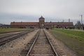 Auschwitz-Birkenau railway lines on a cold gray winter day Royalty Free Stock Photo