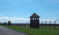 Auschwitz Concentration Camp Fence with Guard Towers Royalty Free Stock Photo