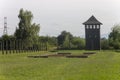 Auschwitz II -Birkenau Extermination camp outdoors and defense tower Royalty Free Stock Photo