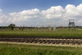 Auschwitz II -Birkenau Extermination camp outdoors and rail tracks Royalty Free Stock Photo