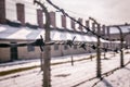 Auschwitz / Oswiecim / Poland - 02.15.2018: Barbed wire fence around a concentration camp.