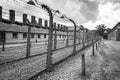 AUSCHWITZ, POLAND - July 11, 2017.Barracks and barbed wire in a Royalty Free Stock Photo