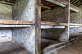 Auschwitz, Poland - June 2, 2018: Prisoner`s beds, bunks inside barrack in Auschwitz Birkenau. Nazi concentration camp Auschwitz