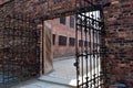 A view of female quarters through security gates at the Concentration Camp in Poland