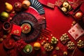 An auspicious arrangement for Chinese Lunar New Year, showcasing a vibrant assortment of fruits, lucky money envelopes, a