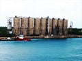 Austere , grey cement silos at FreePort harbour, Bahamas