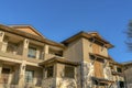 Austin, Texas- Apartment building facade with brown color scheme and balconies near Lake Austin Royalty Free Stock Photo