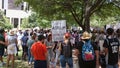 AUSTIN, TEXAS - JULY 2, 2019 - People protesting against President Donald Trump and border camps. Different demands written on