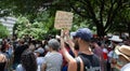 AUSTIN, TEXAS - JULY 2, 2019 - People protesting against President Donald Trump and border camps. Different demands written on