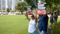 AUSTIN, TEXAS - JULY 2, 2019 - People protesting against President Donald Trump and border camps. Different demands written on