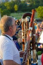 Two bassoons with the one behind being a contra-bassoon