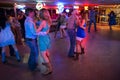 People dancing country music in the Broken Spoke dance hall in Austin, Texas