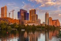 Austin, Texas with new buildings rising, reflecting in Lady Bird Lake at sunset / Austin Skyline and new constructions Royalty Free Stock Photo