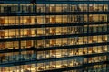 Early morning view of an office building featuring empty offices, couches, and open space at the start of the day Royalty Free Stock Photo