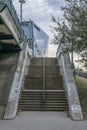 Austin, Texas- Wide outdoor concrete staircase with handrails in the middle Royalty Free Stock Photo