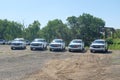 A fleet of White Chevy Tahoe equipped with Feniex Emergency Products