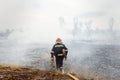 Australia bushfires, The fire is fueled by wind and heat. firefighters spray water to wildfire Royalty Free Stock Photo